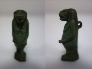 ECM 707 - Faience figurine of Taweret. The side view shows the suspension loop, which would have enabled the owner of the amulet to wear it in life and in death. © Eton Myers Collection, University of Birmingham
