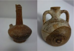 Two vessels discovered at Balabish but imported into New Kingdom Egypt. On the left is a fragmentary juglet or bilbil that once contained oil and was likely manufactured in Cyprus. It was discovered in Tomb 157 at Balabish. On the right is a Mycenaean globular vertical flask with an elaborate design in concentric circles which was discovered in Tomb 50 at Balabish. © Eton Myers Collection, University of Birmingham