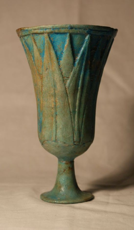 Lotiform chalices, such as ECM 811, were usually made of faience. The lotus imagery and the vivid blue were both linked to fertility and rebirth by the ancient Egyptians.