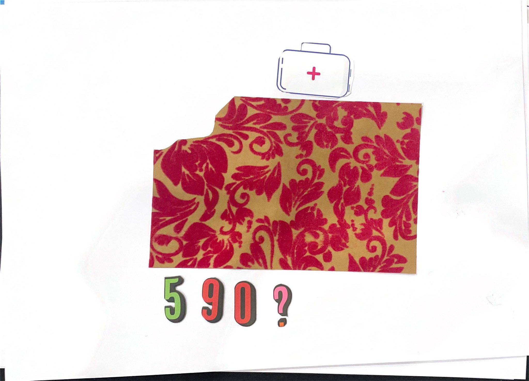 A poster by a young child with a cutout image of a first aid kit with a patterned block below it.