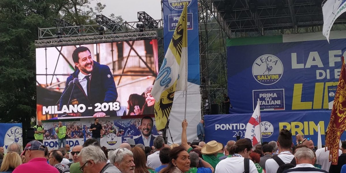 League rally in Pontida, Matteo Salvini appears on a big screen to the left hand side of the image Italy, September 2019