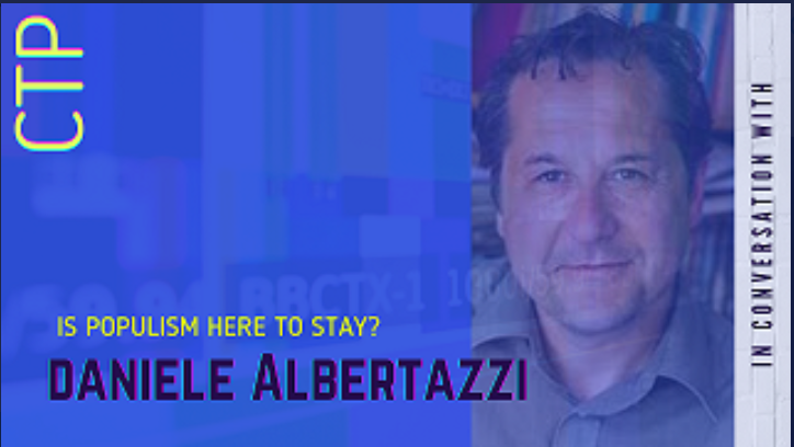 graphic advertising the Coffee Talk Politics Podcast on 22nd January 2022. Features black and yellow text on a light blue/purple background and a photograph of Daniele Albertazzi. Daniele Albertazzi is a middle aged white man wearing an open necked green shirt