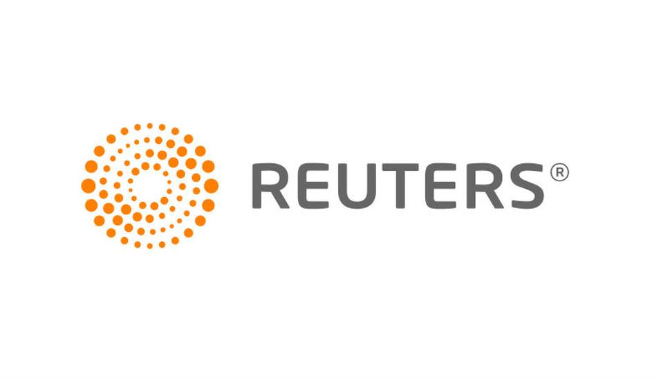 Logo of the Reuters news wire service. it consists of the name Reuters in squared off block capitals in light grey to the right of the logo and a spiral comprising light orange dots as if a swirling portal or a radio wave signal to the left